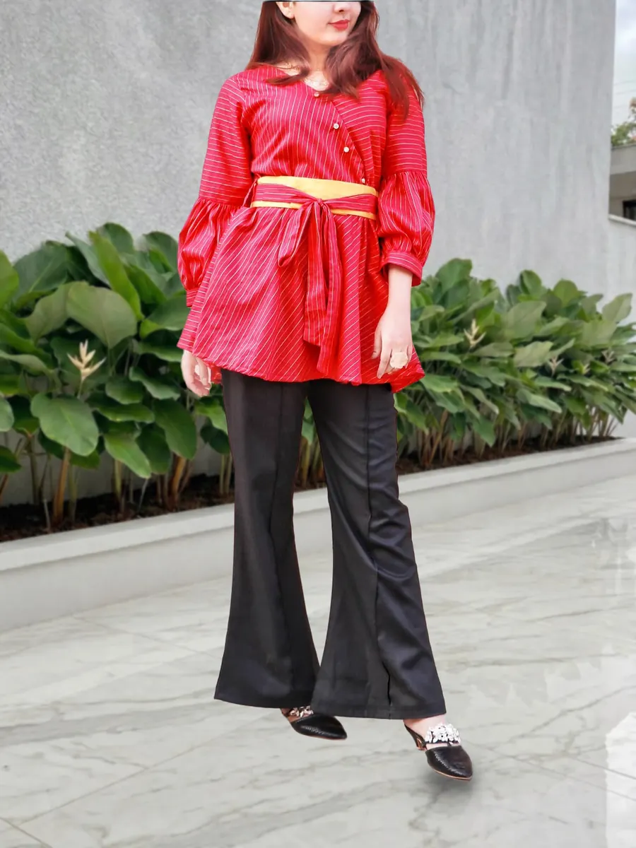 Gerbera Daisy, puff-sleeve shirt with black flared trousers