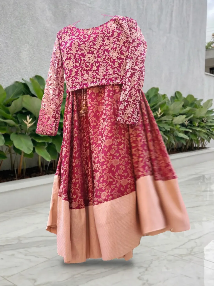 Magenta, banarsi lehenga with a gotta-work blouse