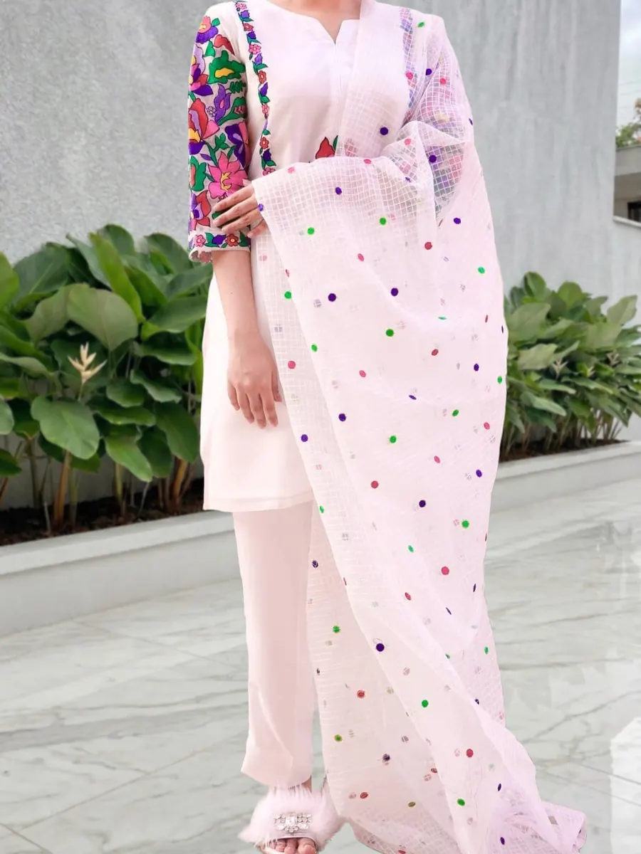 Motley, colourful embroidered organza shirt